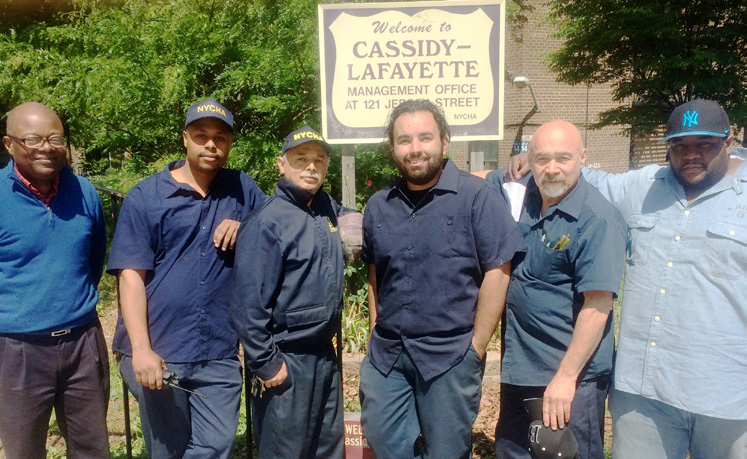 staff in front of Cassidy-Lafayette Gardens