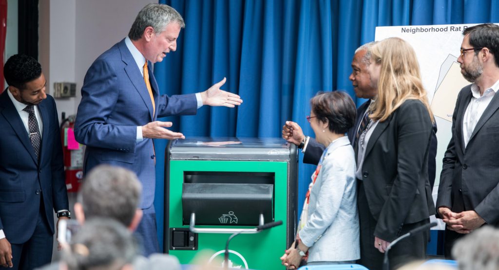 Mayor de Blasio with rat-resistant trash can