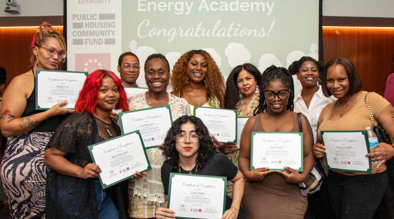 group of women holding certificates