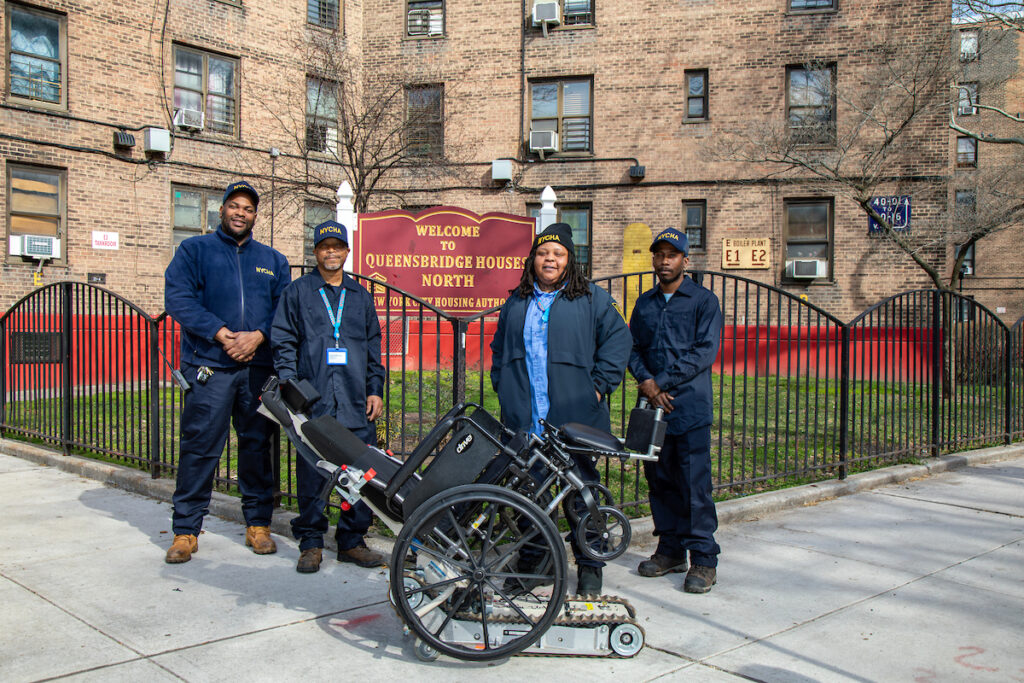 The caretakers who assist with the stair climber devices at Queensbridge.
