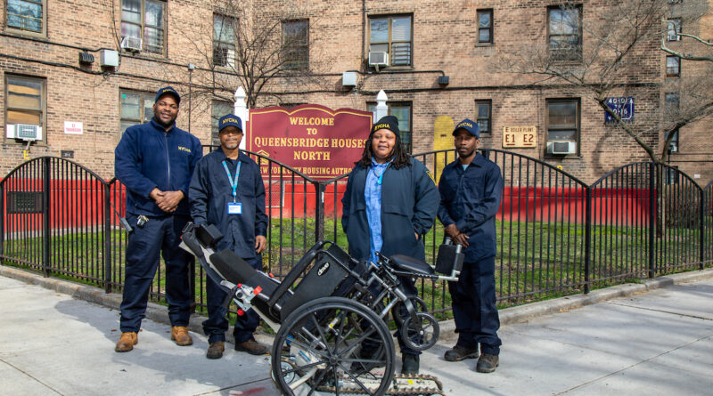 The caretakers who assist with the stair climber devices at Queensbridge.