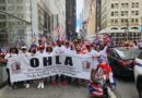 group of people holding OHLA banner at PR Day Parade