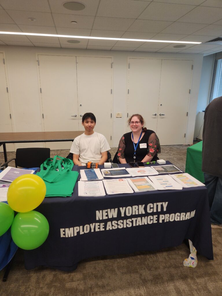 two people seated at table