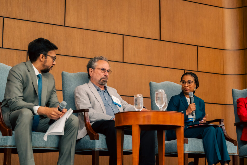 three people on a panel