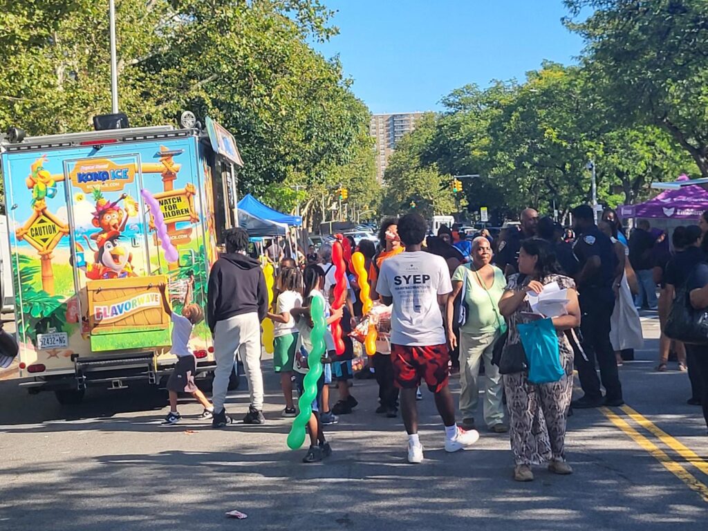 people outside a street festival