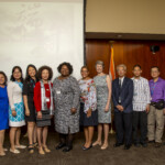 From left to right, Administrative Staff Analyst Larry Sit, former CAA Board Member Na Na Sun, Housing Manager Susan Leong-Loo, Accounts Payable and Utility Management Assistant Director Linda Zhang, Executive Vice President and Chief Administrative Officer Kerri Jew, Leased Housing Department Chief Nancy Lam, Executive Vice President of Leased Housing Lakesha Miller, Director of Employee Engagement Yvette Andino, Executive Vice President for Capital Projects Deborah Goddard, Chinese-American Association NYC Representative Ricky Kwong, Associate Staff Analyst Wai Man Leong, Administrative Staff Analyst Remington Lo, Timekeeper Lin Fong, Field Systems Manager Daniel Lam, and Associate Staff Analyst Lana Yau. Dragon Boat Festival