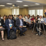 Marlon Forbes, Deputy Director of the Office of Mold Assessment and Remediation, addresses attendees Job fair