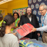 Backpack giveaway at Williams Plaza Backpack giveaway at Williams Plaza