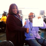 Housing Manager Donesia Ellis presenting a certification of appreciation