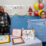 John DeCarlo Award winner Maria Campos with Woodside Houses Superintendent Kevin German. DeCarlo awards