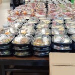 Individually packaged meals for distribution.