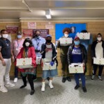 From l. to r.: Leroy Williams, NYCHA’s Director of Community Development; Charisse King, NYCHA Community Coordinator; Leona Shoemaker, Resident Association President of King Towers Houses; Resident Association members and youth volunteers.