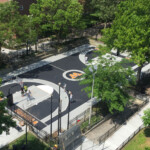 A newly redesigned basketball court at Woodside Houses organized through the PlayStreets program. A newly redesigned basketball court at Woodside Houses organized through the PlayStreets program.