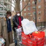 St. Nicholas Houses resident leaders prepare for a toy drive they hosted at the development.