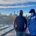 David Artis, Assistant Resident Buildings Superintendent, and Tyhiem Harris, Floating Supervisor of Housing Caretakers, during a site visit of the new Queensbridge Houses rooftop. Queensbridge North site visit