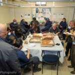 Work order program staff enjoyed pizza and refreshments during a lunch celebration at West Brighton Houses.