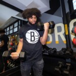 Community youth are excited to return to working out in the new fitness room, which features weight equipment, treadmills, and a bicycle machine.