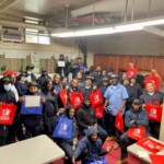 Staff show off swag at Marcy Houses Customer service Marcy