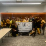 RSPI team wearing yellow and black for 'Bee-Cause You Are Essential' theme