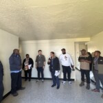 Senior staff site visit and walk-through at Whitman Houses